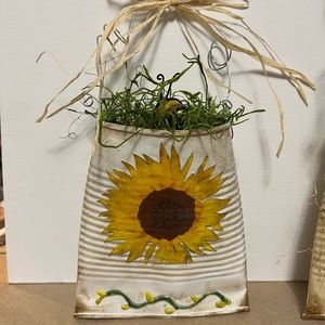 Sunflower tin wall hanging with bumblebee accent and raffia bow. Super cute!